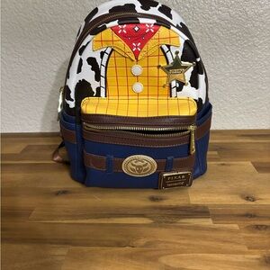 Loungefly Pixar Sheriff Backpack - Blue, Brown, Yellow